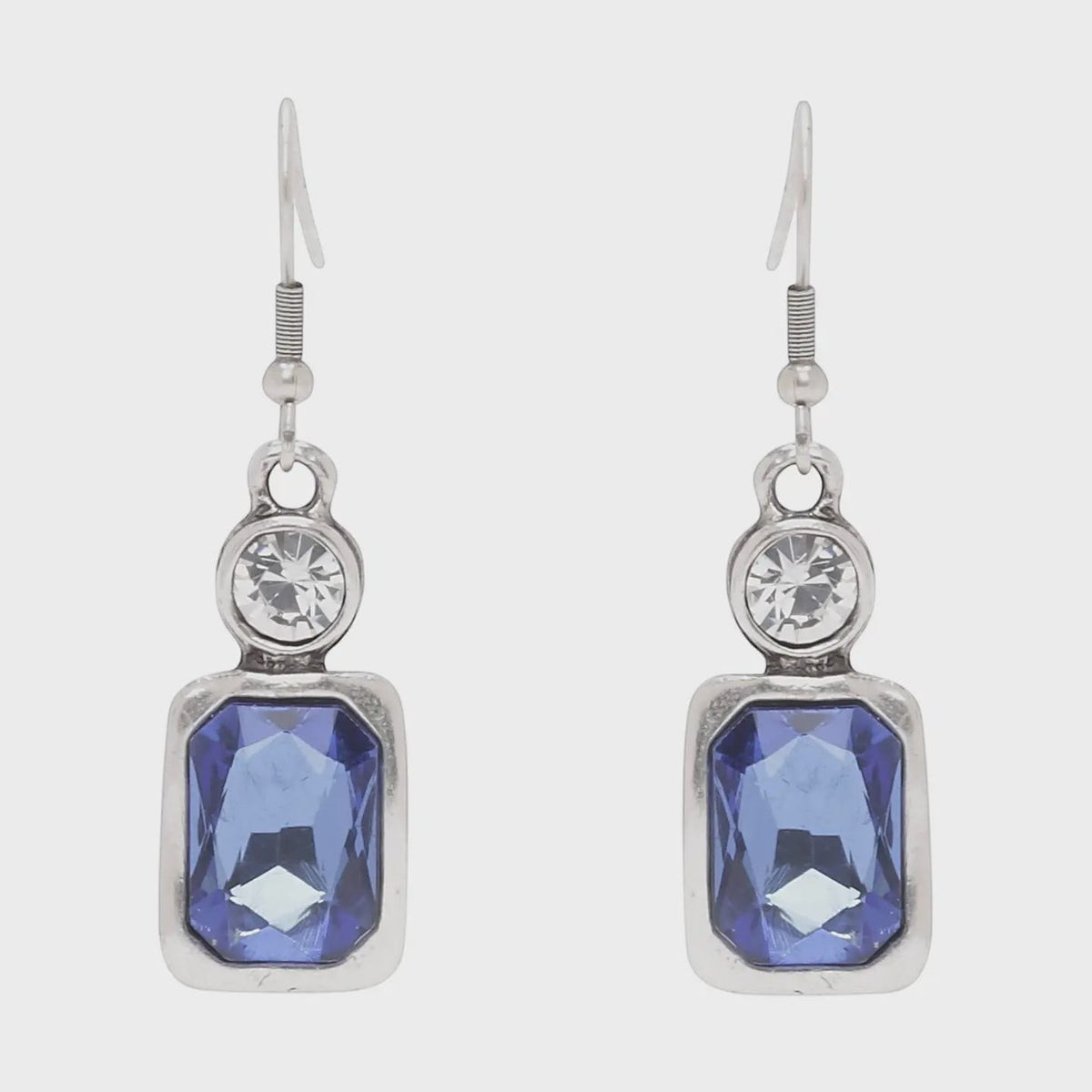 Chandeliers Boutique ny handmade pewter earrings featuring rectangular blue crystals and clear stones in silver plating
