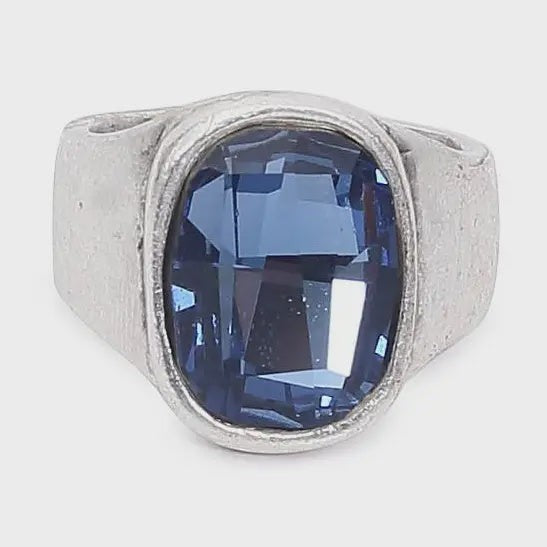 Chandeliers Boutique ny bohemian style ring with a large blue crystal set in a silver-plated brass band.