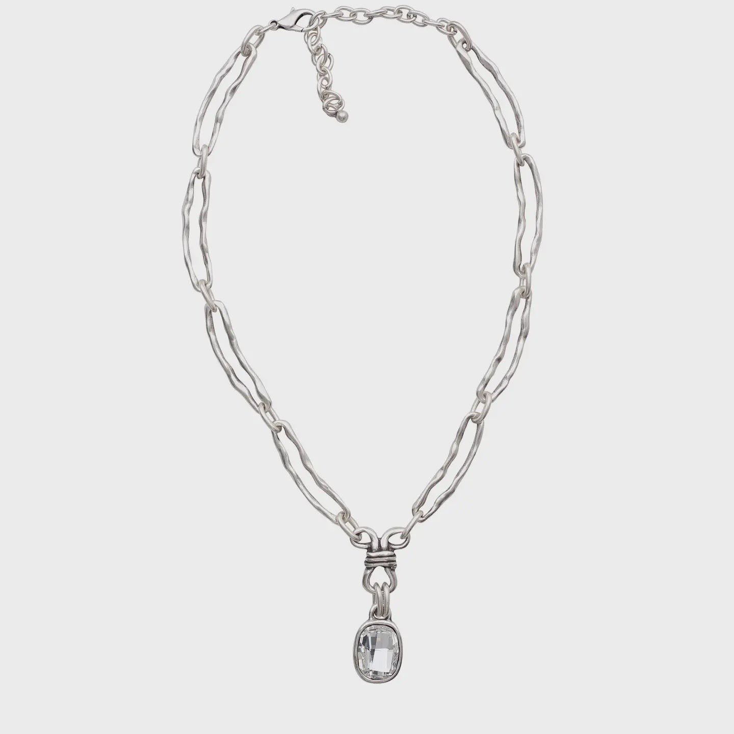 Chandeliers Boutique ny Lucky Day necklace featuring a silver-plated chain with a clear crystal pendant.