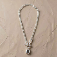 Chandeliers Boutique ny pewter toggle necklace featuring a silver-tone chunky link chain and dark rectangular pendant