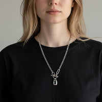Chandeliers Boutique ny pewter toggle necklace featuring a silver-tone chunky link chain and a dark rectangular pendant