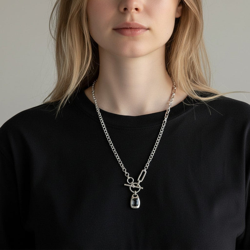 Chandeliers Boutique ny pewter toggle necklace featuring a silver-tone chunky link chain and a dark rectangular pendant