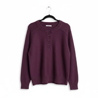Chandeliers Boutique ny deep purple fuzzy crew neck sweater with a half button placket and ribbed cuffs.