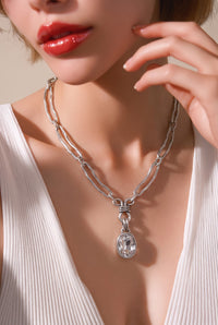 Chandeliers Boutique ny Lucky Day necklace featuring a silver-plated oval crystal pendant on a textured chain