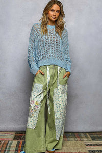 POL Openwork Round Neck High Low Knit Top - Chandeliers Boutique ny