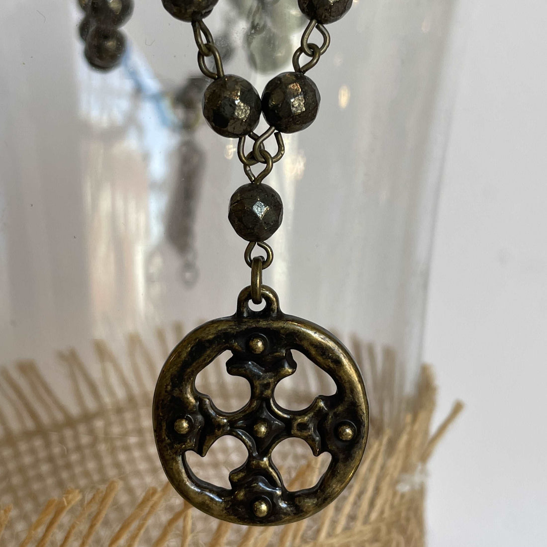 Beaded metal w cross pendant